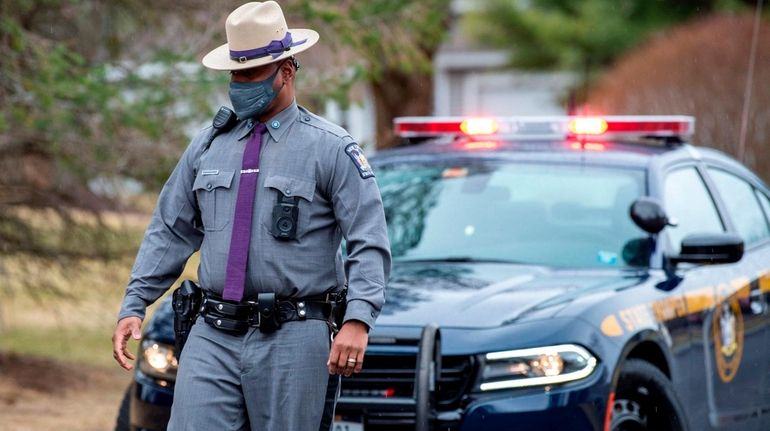 A New York State trooper equipped with a body camera.