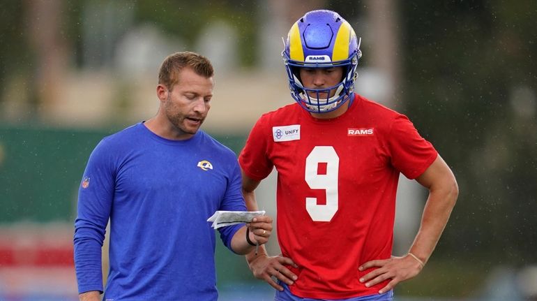 Rams head coach Sean McVay and quarterback Matthew Stafford talk during...