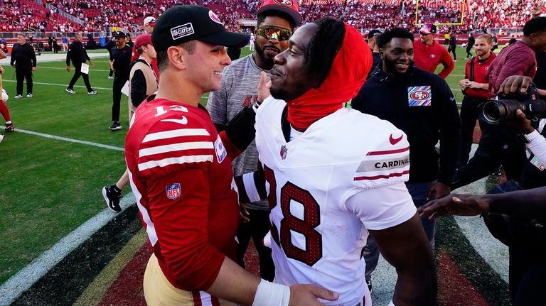 McCaffrey scores 4 TDs to lead the 49ers past the Cardinals 35-16 