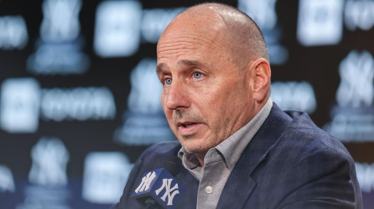 Yankees GM Brian Cashman speaks during a news conference at...