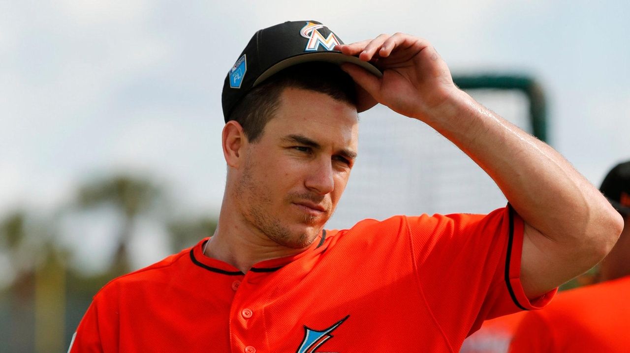 J.T. Realmuto of the Miami Marlins prepares to take the field during