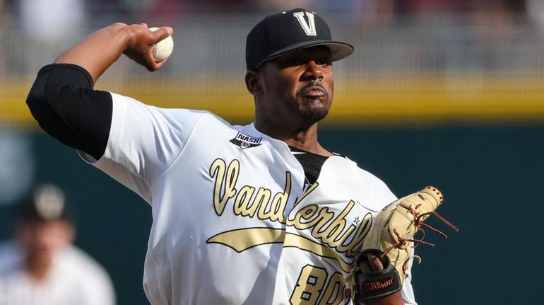 Vanderbilt pitcher Kumar Rocker throws during the first inning in Game...