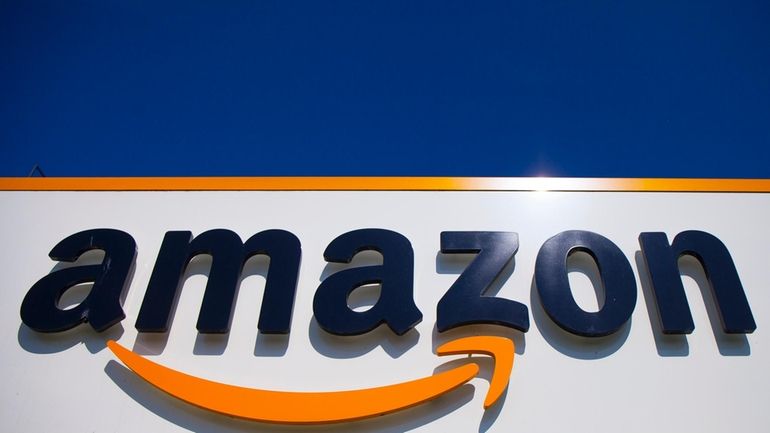 The Amazon logo is seen in Douai, northern France, Thursday,...