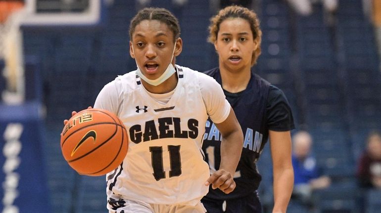 Taryn Barbot of St. Mary's dribbles down court in the...