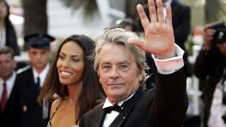 French actor Alain Delon and model Bianca di Sofia arrive...