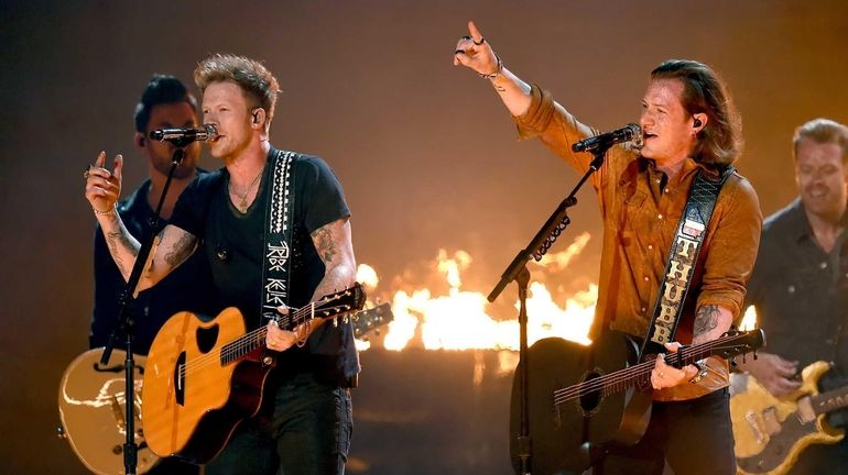 Musicians Brian Kelley, left, and Tyler Hubbard of Florida Georgia...