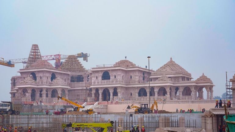 FILE- A construction crew works on Ram Mandir, a Hindu...