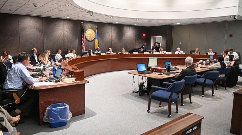 The Suffolk County Legislature, shown here in July 2019, has begun...