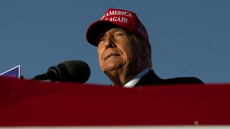 Former U.S. President Donald Trump speaks during a campaign event...