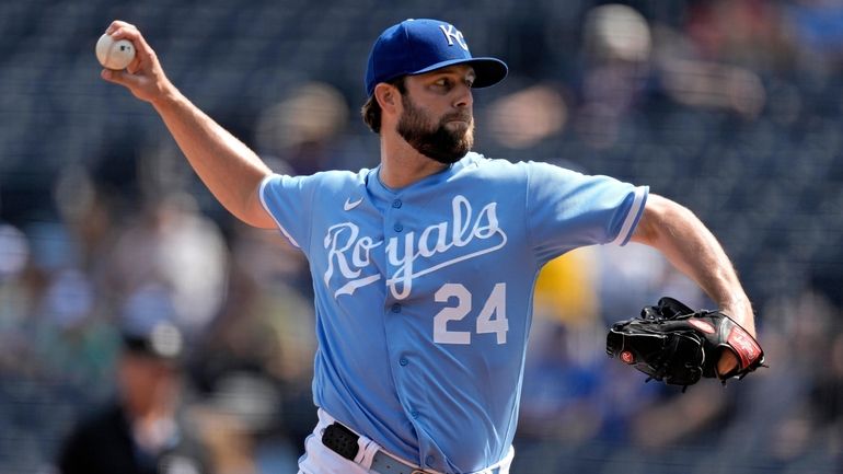 Kansas City Royals starting pitcher Jordan Lyles throws during the...