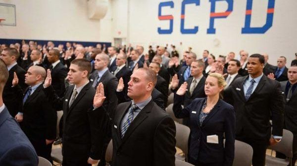 Recruits stand ready to serve at the Suffolk County Police...