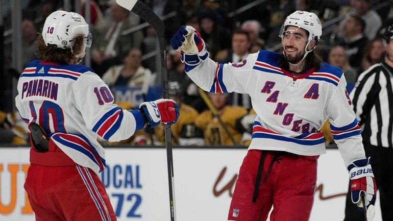 Rangers center Mika Zibanejad celebrates his second goal of the...