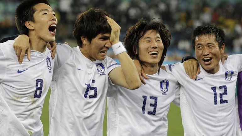 From left, South Korea's Kim Jung-woo, South Korea's Kim Dong-jin,...