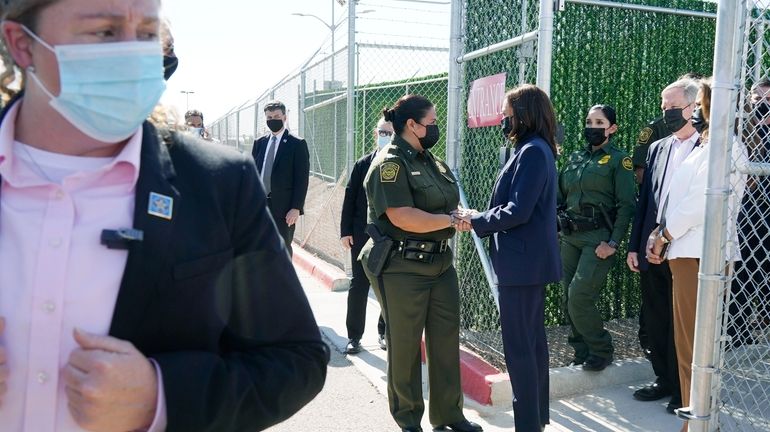 Vice President Kamala Harris talks to Gloria Chavez, Chief Patrol...