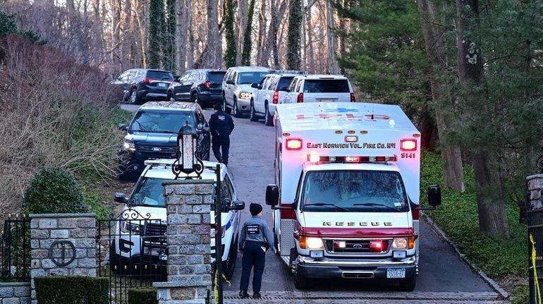 Authorities at the scene of the work site collapse at...