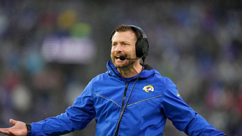 Los Angeles Rams head coach Sean McVay shouts at officials...