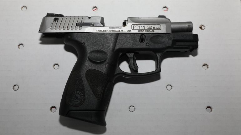 One of the weapons recovered at Saturday night's shooting in...