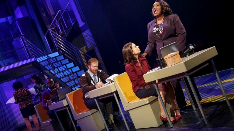 Moya Angela, standing, and, seated from right, Margo Seibert, David...