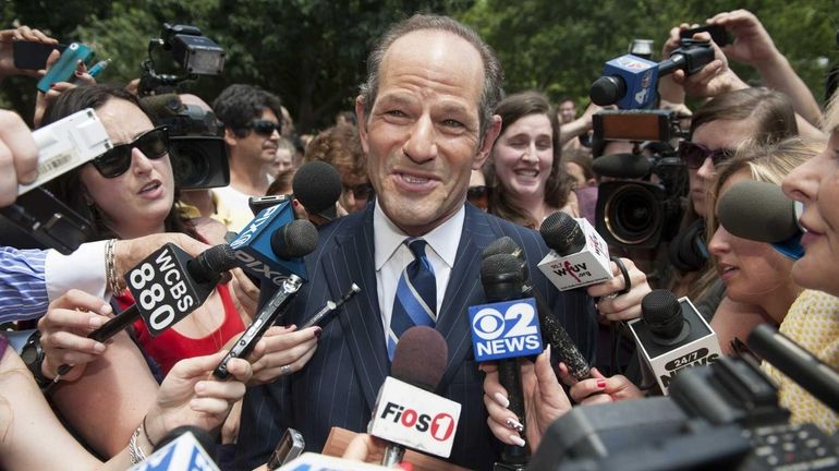 Former New York State Governor Eliot Spitzer speaks to the...