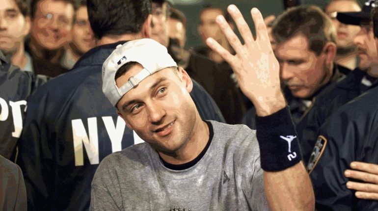 Yankees shortstop Derek Jeter holds up four fingers to signify...