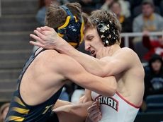 Fahrbach and Mangano wrestle their way to state titles