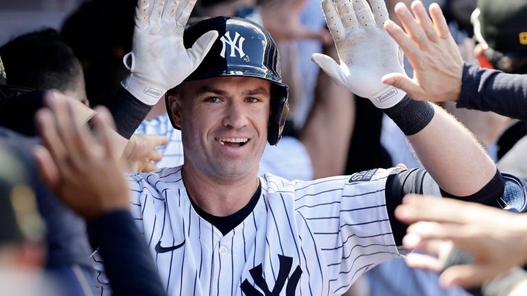 Jon Berti of the Yankees celebrates his fourth-inning three-run home...