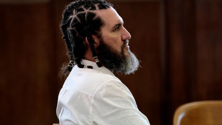 Defendant Thomas Kinworthy Jr. sits in the courtroom during his...