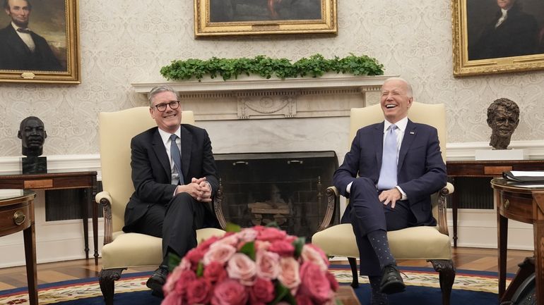 Britain's Prime Minister Keir Starmer, left, meets with U.S. President...