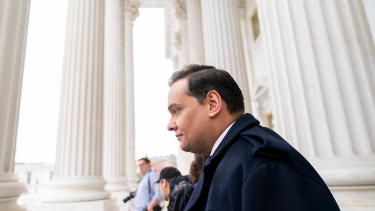 George Santos leaves the Capitol after being expelled from the...