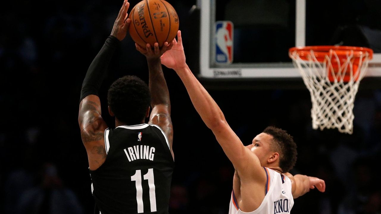 Nets squander lead but Kyrie Irving scores two big baskets in final