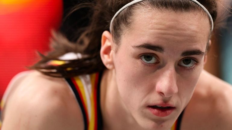 Caitlin Clark of the Indiana Fever against the New York...