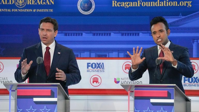 Republican presidential candidates, Florida Gov. Ron DeSantis, left, and entrepreneur...