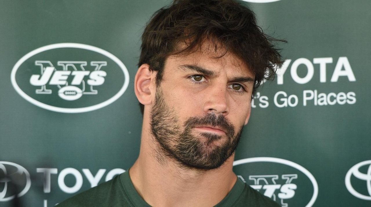 Wide receiver Eric Decker (87) watches a drill after participating earlier  in the afternoon session …