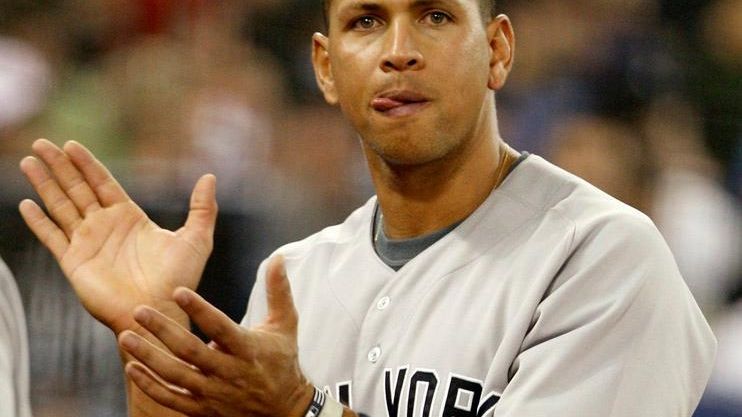 Alex Rodriguez claps after the Yankees scored a run against...