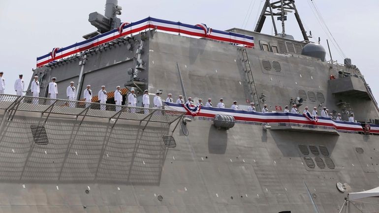 Thousands attend the commissioning ceremony for the USS Manchester at...