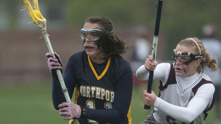 Northport's Shannon Gilroy drives to the goal as Bay Shore...