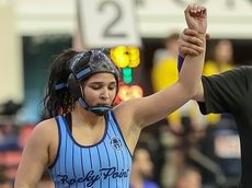 4 Hernandez siblings reach Suffolk wrestling finals, 2 win titles