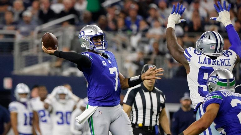 Seattle Seahawks quarterback Geno Smith (7) throws a touchdown pass...