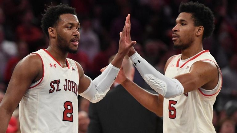 St. John's guard Shamorie Ponds, left, and guard Justin Simon...