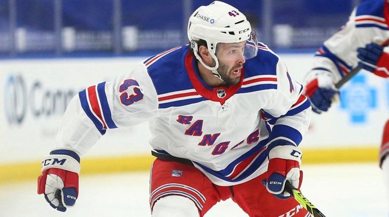 Rangers forward Colin Blackwell controls the puck during the first...