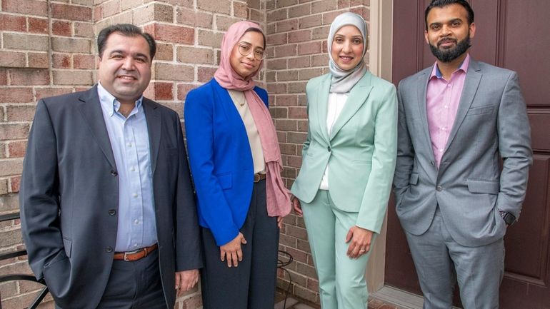 Dr. Uzma Syed, second from right, heads the grassroots Eid Holiday Coalition...