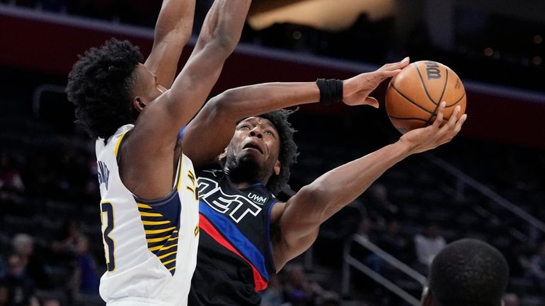 Detroit Pistons center James Wiseman (13) attempts a layup as...