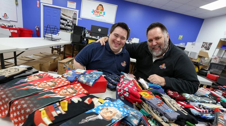 John Cronin and his father, Mark, partners at John's Crazy Socks, with...
