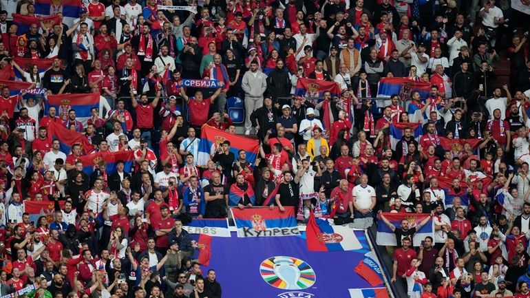 Serbia fans cheer during a Group C match between Serbia...