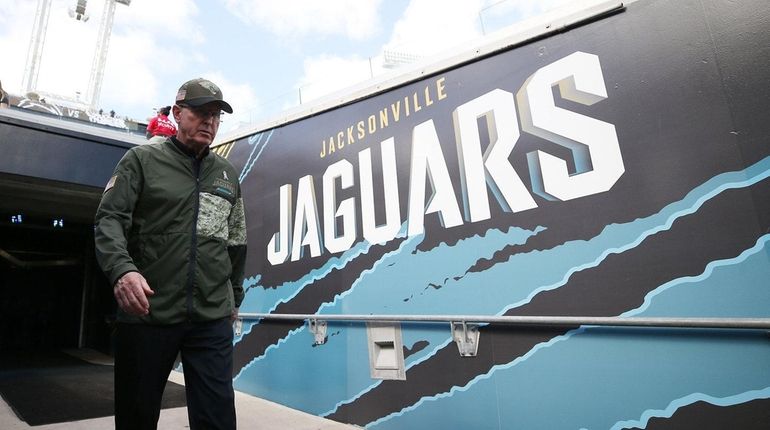 Jaguars executive VP of football operations Tom Coughlin walks to...