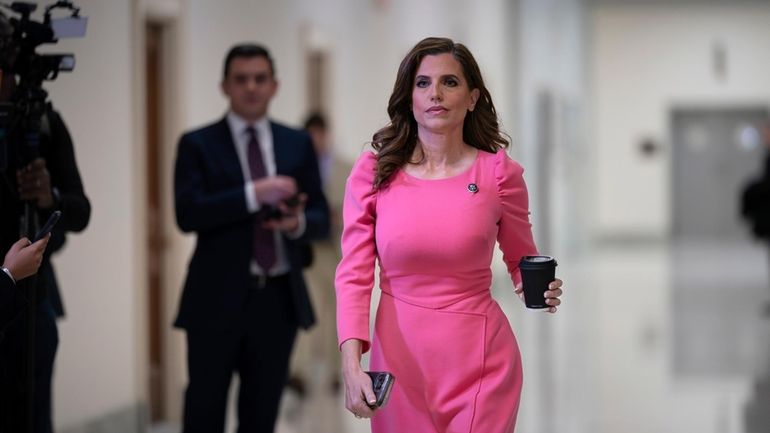 Rep. Nancy Mace, walks to join other members of the...