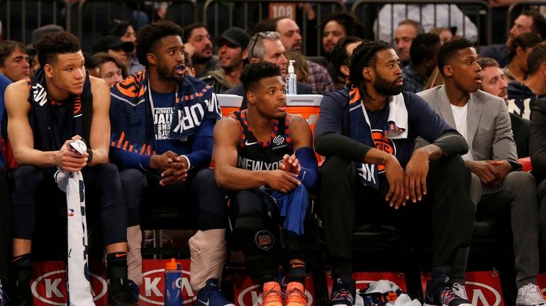 From left, the Knicks' Kevin Knox, Wesley Matthews, Dennis Smith Jr.,...