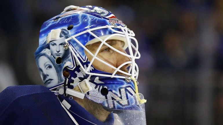 Henrik Lundqvist looks on during a game against the New...