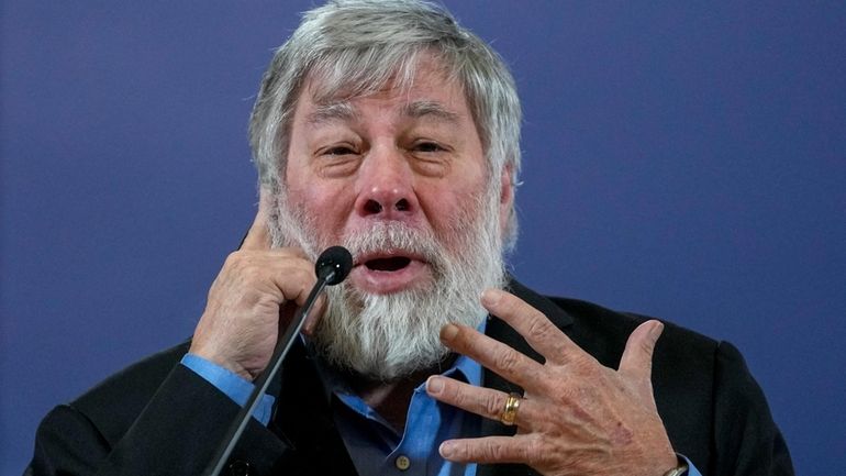 Apple co-founder Steve Wozniak speaks during a press conference after...