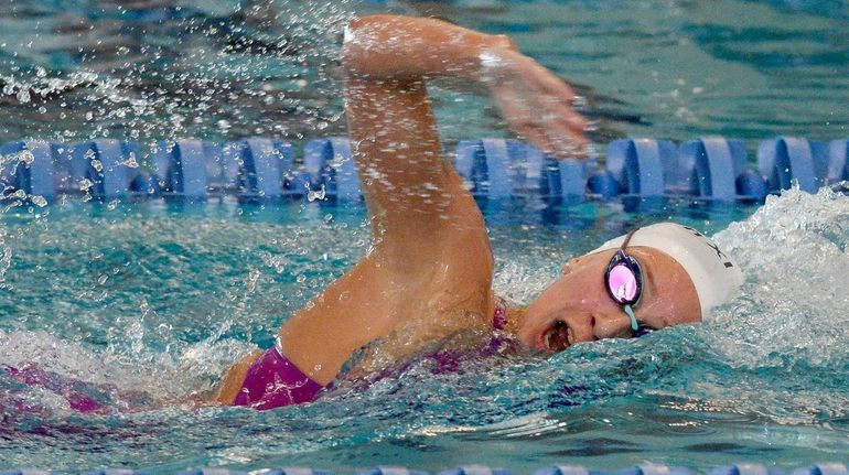 Northport-Commack's Chloe Stepanek swims in a preliminary heat of the...